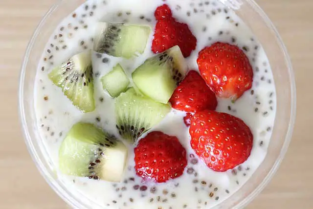 image of chia seeds in yogurt parfait with strawberries and kiwi